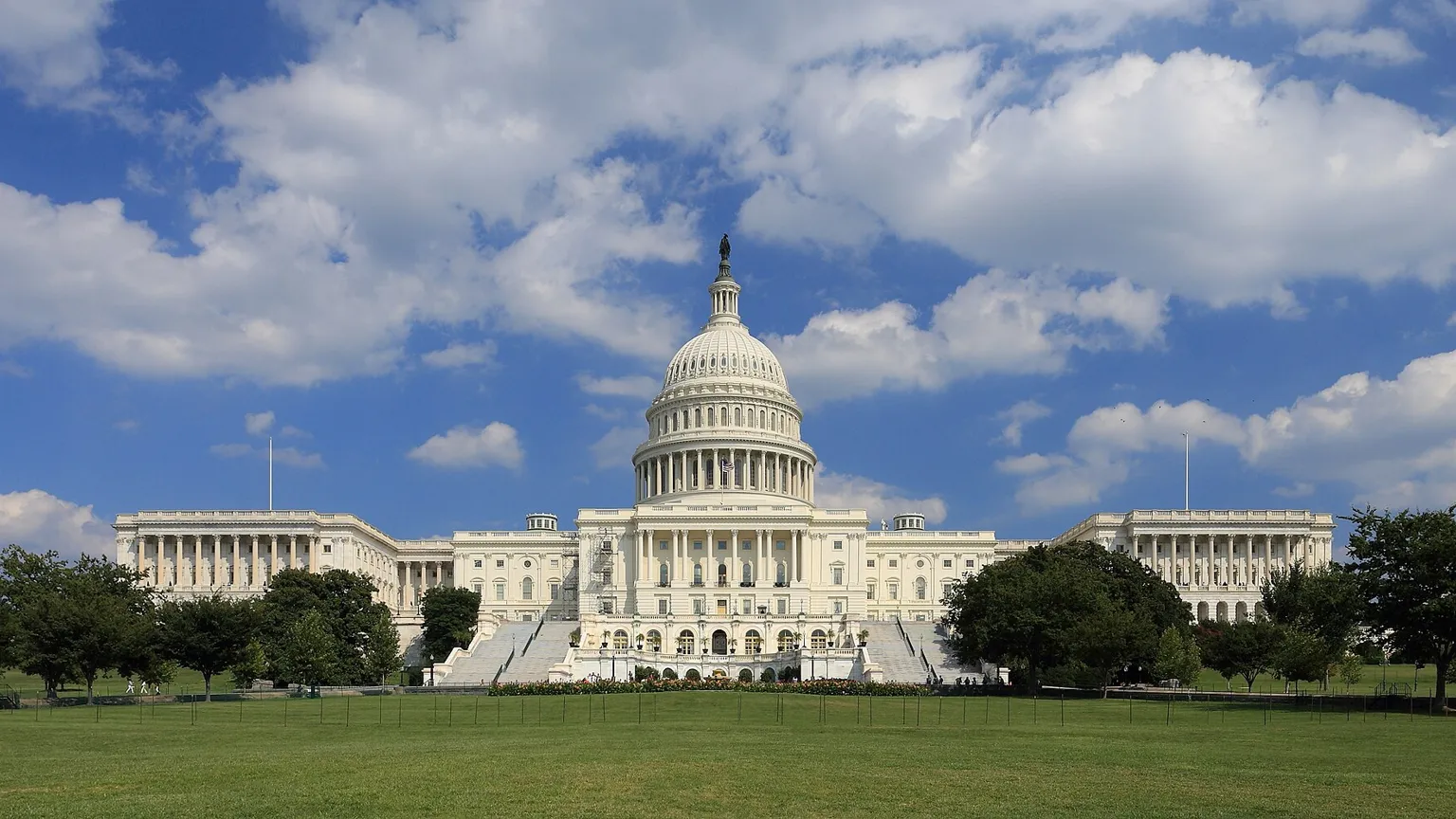 AI illustration: United States Capitol under a blue sky