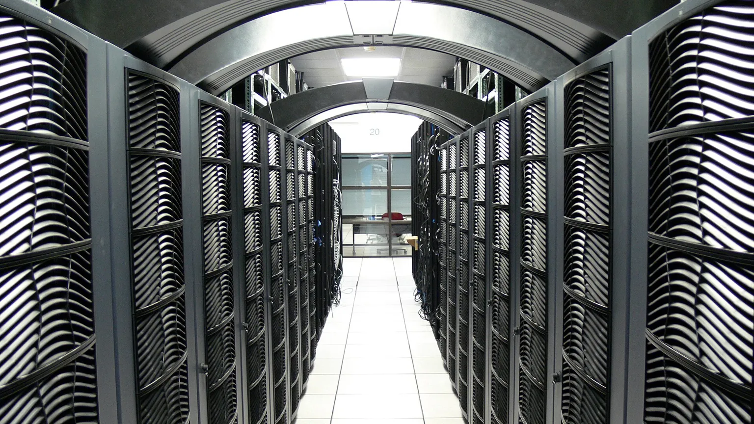 Rows of server racks in a data center