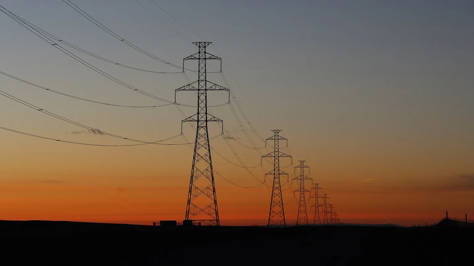 Electricity transmission lines at sunset