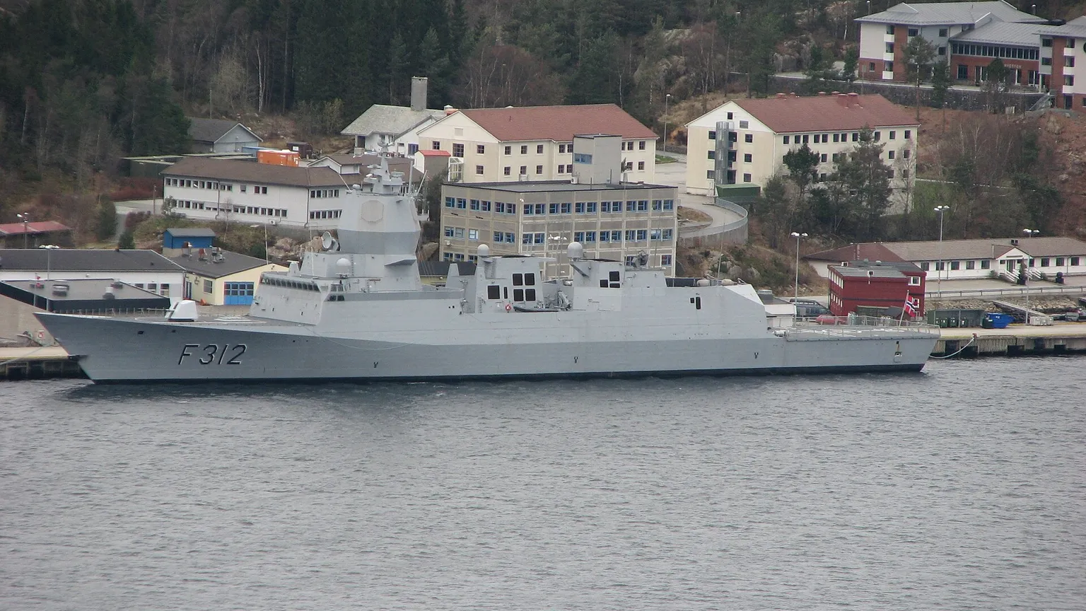 AI illustration: Naval vessels moored in a harbour