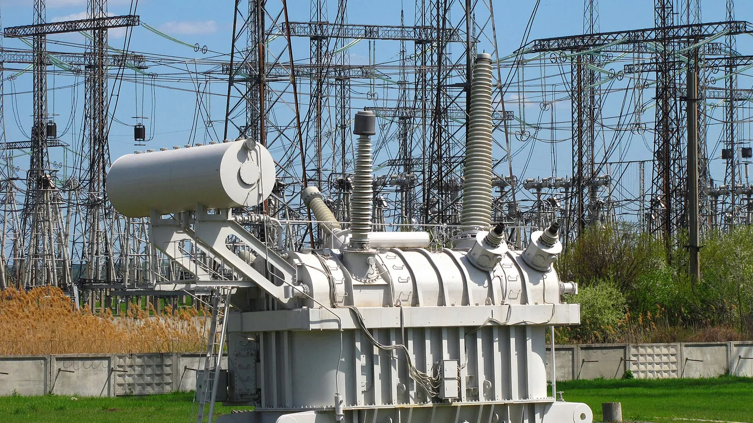 A large power transformer at an electrical substation